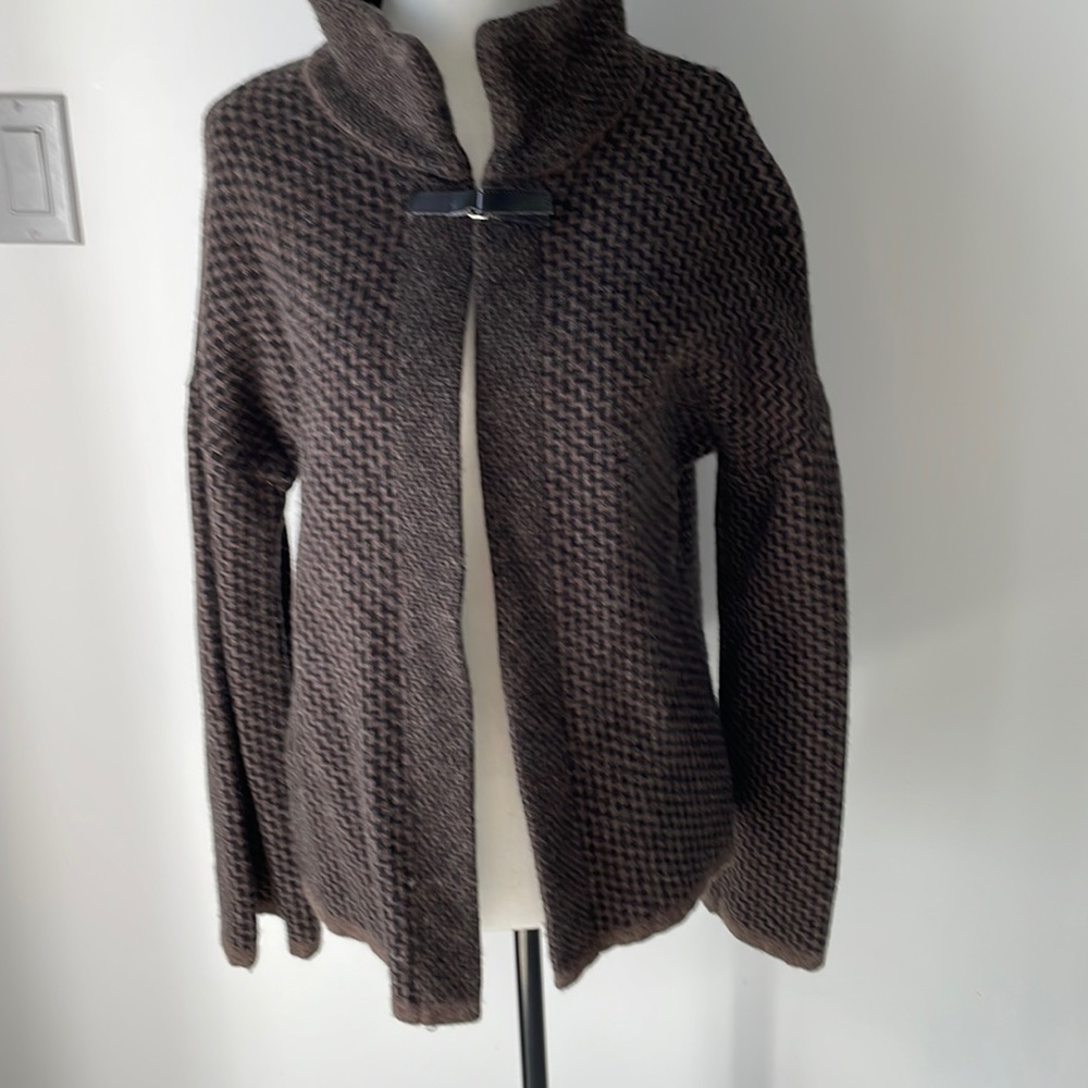 NWOT. Chiaramente woman’s brown open cardigan top with buckle. Size medium.